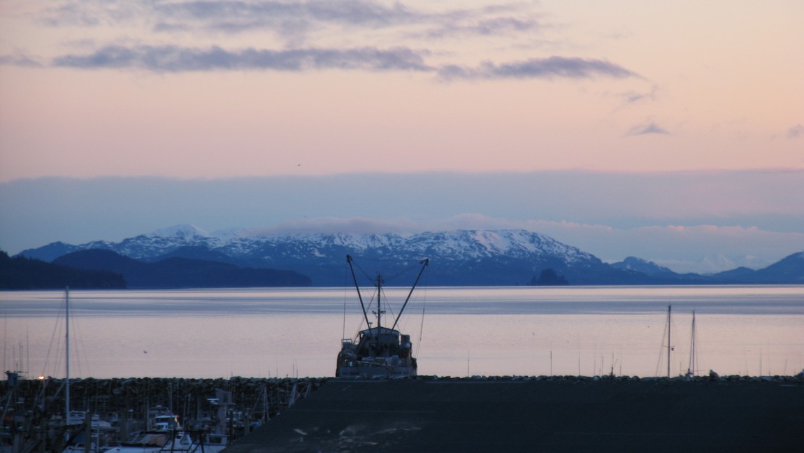 Sunset over a fishing boat