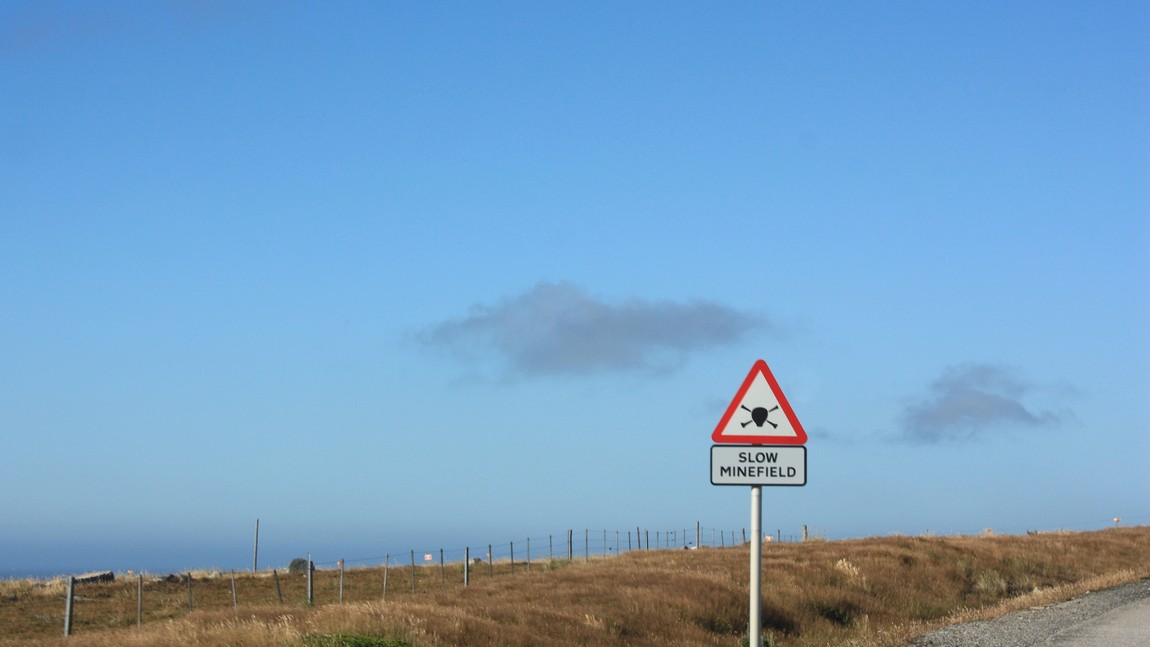 Mine field warning sign