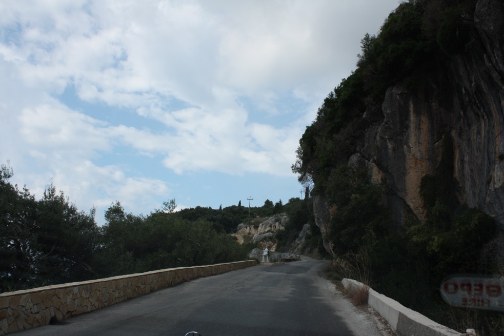 Narrow winding road leading up to the town of Lakones
