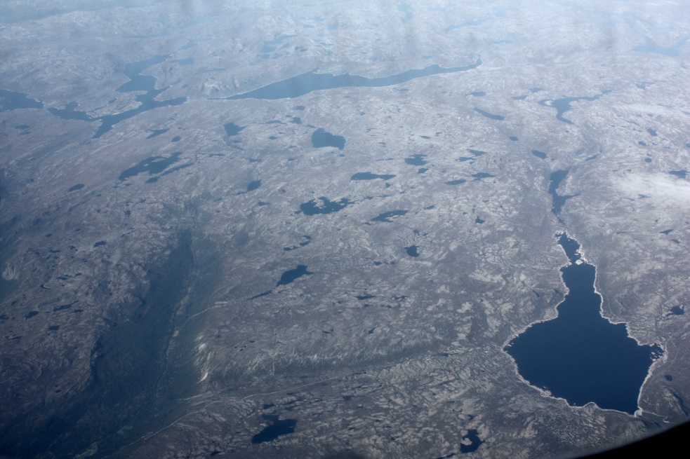 Sonstevatn lake and the road heading Southeast