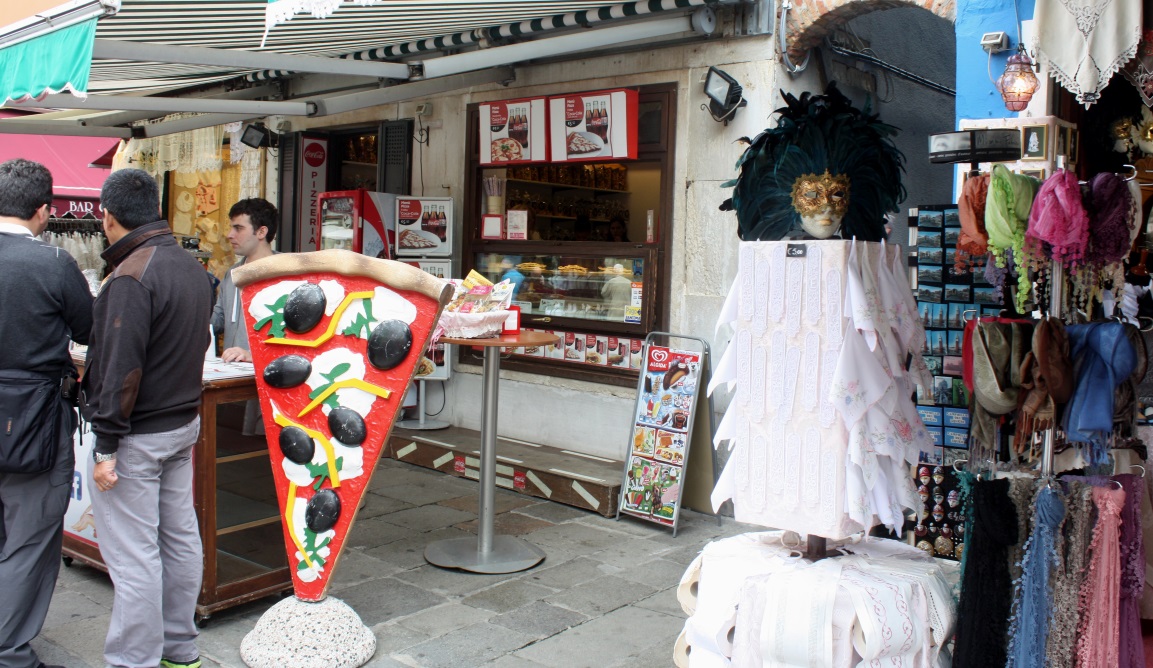 Outdoor eatery with a very effective sign