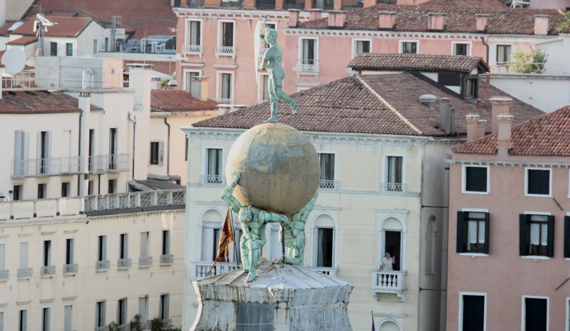 Statue at the tip of the Punta della Dogana art museum