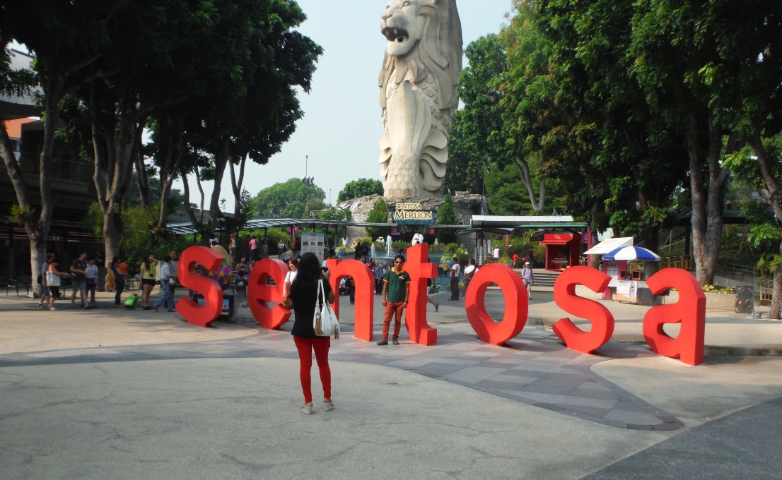 Large red letters with the lion in the background