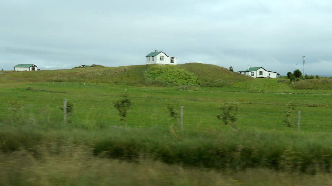 Small houses East of Breidhabolsstadhur Hill
