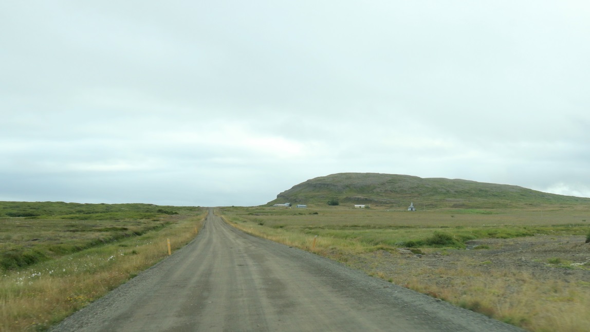 One mile West of Breidab�lsstadur