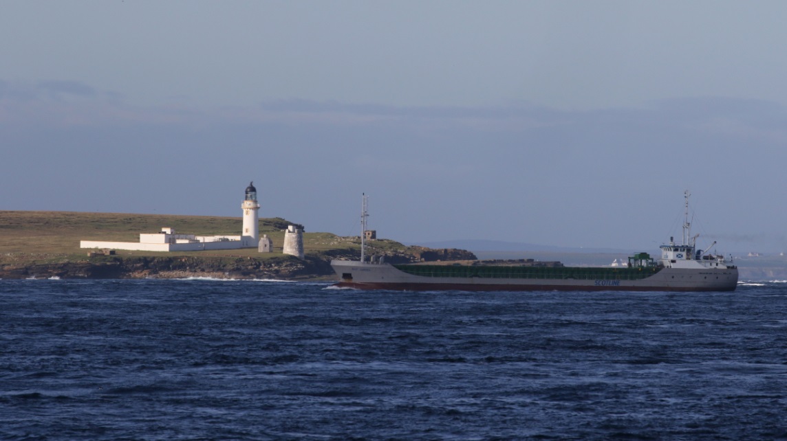 Ship passing the Stroma lighthouse