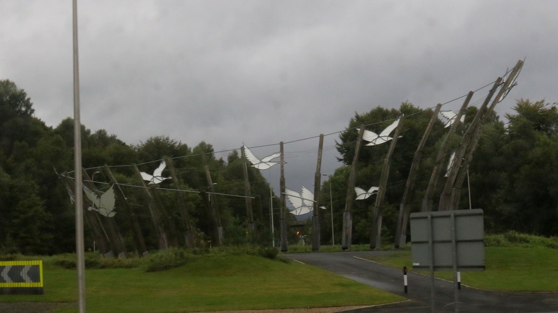 Ducks in flight sculpture