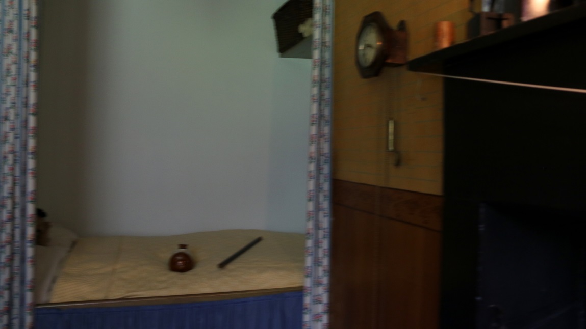 Bed in a closet in the kitchen