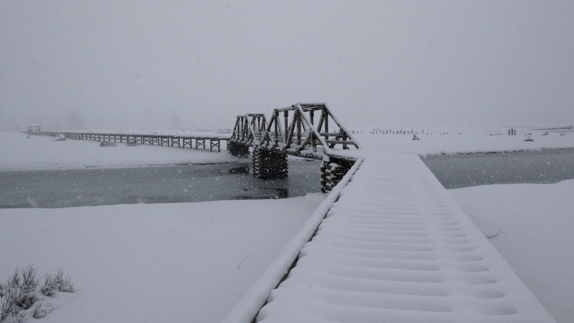 Snow on top of ice on the boardwalk